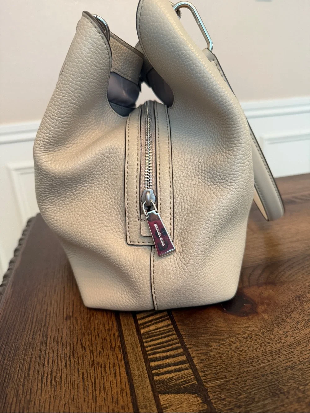 Michael Kors Raven pebbled leather shoulder bag featuring silver-tone hardware